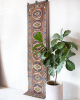 Vintage Turkish runner rug in living room setting, old rug, antique rug, pastel colors, faded colors, Turkish rug, vintage rug, soft rug, Portland, Oregon, rug store, rug shop, local shop