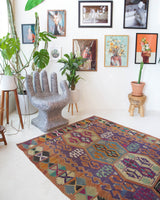 Vintage kilim rug in living room setting, bright colors, wild shaman, soft rug, bold color, Portland, Oregon, rug store, rug shop, local shop, vintage rug, modern kilim, warm colors