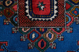 Vintage Turkish runner rug in a living room setting, pile rug, Turkish rug, vintage rug, portland, rug shop, bright colors, wild shaman, soft rug, bold color, Portland, Oregon, rug store, rug shop, local shop, antique rug