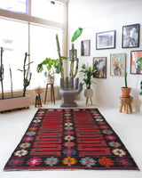 Vintage kilim rug in living room setting, bright colors, wild shaman, soft rug, bold color, Portland, Oregon, rug store, rug shop, local shop, vintage rug, modern kilim, warm colors