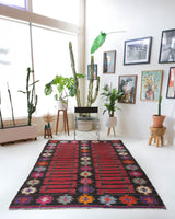 Vintage kilim rug in living room setting, bright colors, wild shaman, soft rug, bold color, Portland, Oregon, rug store, rug shop, local shop, vintage rug, modern kilim, warm colors