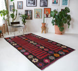 Vintage kilim rug in living room setting, bright colors, wild shaman, soft rug, bold color, Portland, Oregon, rug store, rug shop, local shop, vintage rug, modern kilim, warm colors