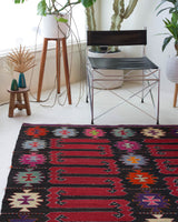Vintage kilim rug in living room setting, bright colors, wild shaman, soft rug, bold color, Portland, Oregon, rug store, rug shop, local shop, vintage rug, modern kilim, warm colors
