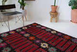Vintage kilim rug in living room setting, bright colors, wild shaman, soft rug, bold color, Portland, Oregon, rug store, rug shop, local shop, vintage rug, modern kilim, warm colors