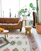 Vintage Turkish rug in living room setting, old rug, antique rug, pastel colors, faded colors, Turkish rug, vintage rug, soft rug, Portland, Oregon, rug store, rug shop, local shop