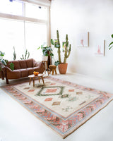 Vintage Turkish rug in living room setting, old rug, antique rug, pastel colors, faded colors, Turkish rug, vintage rug, soft rug, Portland, Oregon, rug store, rug shop, local shopVintage Turkish rug in living room setting, old rug, antique rug, pastel colors, faded colors, Turkish rug, vintage rug, soft rug, Portland, Oregon, rug store, rug shop, local shop