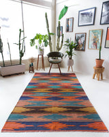 Vintage kilim rug in living room setting, bright colors, wild shaman, soft rug, bold color, Portland, Oregon, rug store, rug shop, local shop, vintage rug, modern kilim, warm colors
