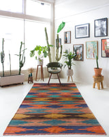 Vintage kilim rug in living room setting, bright colors, wild shaman, soft rug, bold color, Portland, Oregon, rug store, rug shop, local shop, vintage rug, modern kilim, warm colors
