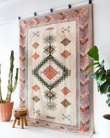 Vintage Turkish rug in living room setting, old rug, antique rug, pastel colors, faded colors, Turkish rug, vintage rug, soft rug, Portland, Oregon, rug store, rug shop, local shop