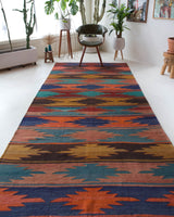 Vintage kilim rug in living room setting, bright colors, wild shaman, soft rug, bold color, Portland, Oregon, rug store, rug shop, local shop, vintage rug, modern kilim, warm colors