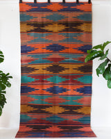 Vintage kilim rug in living room setting, bright colors, wild shaman, soft rug, bold color, Portland, Oregon, rug store, rug shop, local shop, vintage rug, modern kilim, warm colors