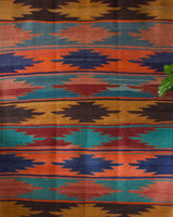 Vintage kilim rug in living room setting, bright colors, wild shaman, soft rug, bold color, Portland, Oregon, rug store, rug shop, local shop, vintage rug, modern kilim, warm colors