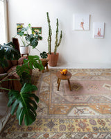 Vintage Turkish rug in living room setting, old rug, antique rug, pastel colors, faded colors, Turkish rug, vintage rug, soft rug, Portland, Oregon, rug store, rug shop, local shop