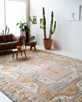 Vintage Turkish rug in living room setting, old rug, antique rug, pastel colors, faded colors, Turkish rug, vintage rug, soft rug, Portland, Oregon, rug store, rug shop, local shop
