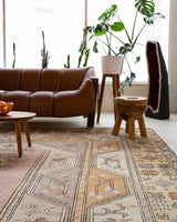 Vintage Turkish rug in living room setting, old rug, antique rug, pastel colors, faded colors, Turkish rug, vintage rug, soft rug, Portland, Oregon, rug store, rug shop, local shop