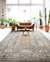 Vintage Turkish rug in living room setting, old rug, antique rug, pastel colors, faded colors, Turkish rug, vintage rug, soft rug, Portland, Oregon, rug store, rug shop, local shop
