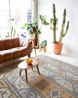 Vintage Turkish rug in living room setting, old rug, antique rug, pastel colors, faded colors, Turkish rug, vintage rug, soft rug, Portland, Oregon, rug store, rug shop, local shop