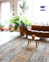 Vintage Turkish rug in living room setting, old rug, antique rug, pastel colors, faded colors, Turkish rug, vintage rug, soft rug, Portland, Oregon, rug store, rug shop, local shop