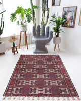 Vintage kilim rug in room decor setting, old rug, antique rug, pastel colors, faded colors, Turkish rug, vintage rug, soft rug, Portland, Oregon, rug store, rug shop, local shop, bold colors, bright colors, faded colors