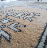 Vintage Turkish rug in living room setting, old rug, antique rug, pastel colors, faded colors, Turkish rug, vintage rug, soft rug, Portland, Oregon, rug store, rug shop, local shop