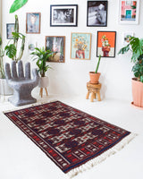 Vintage kilim rug in living room setting, bright colors, wild shaman, soft rug, bold color, Portland, Oregon, rug store, rug shop, local shop, vintage rug, modern kilim, warm colors