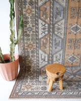 Vintage Turkish rug in living room setting, old rug, antique rug, pastel colors, faded colors, Turkish rug, vintage rug, soft rug, Portland, Oregon, rug store, rug shop, local shop