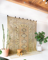 Vintage Turkish rug in living room setting, old rug, antique rug, pastel colors, faded colors, Turkish rug, vintage rug, soft rug, Portland, Oregon, rug store, rug shop, local shop