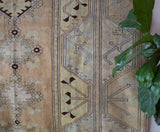 Vintage Turkish rug in living room setting, old rug, antique rug, pastel colors, faded colors, Turkish rug, vintage rug, soft rug, Portland, Oregon, rug store, rug shop, local shop