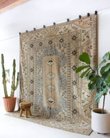 Vintage Turkish rug in living room setting, old rug, antique rug, pastel colors, faded colors, Turkish rug, vintage rug, soft rug, Portland, Oregon, rug store, rug shop, local shop