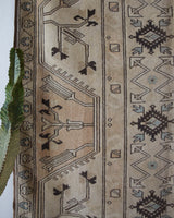 Vintage Turkish rug in living room setting, old rug, antique rug, pastel colors, faded colors, Turkish rug, vintage rug, soft rug, Portland, Oregon, rug store, rug shop, local shop