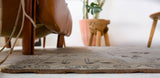 Vintage Turkish rug in living room setting, old rug, antique rug, pastel colors, faded colors, Turkish rug, vintage rug, soft rug, Portland, Oregon, rug store, rug shop, local shop
