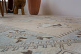 Vintage Turkish rug in living room setting, old rug, antique rug, pastel colors, faded colors, Turkish rug, vintage rug, soft rug, Portland, Oregon, rug store, rug shop, local shop