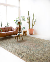 Vintage Turkish rug in living room setting, old rug, antique rug, pastel colors, faded colors, Turkish rug, vintage rug, soft rug, Portland, Oregon, rug store, rug shop, local shop