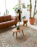 Vintage Turkish rug in living room setting, old rug, antique rug, pastel colors, faded colors, Turkish rug, vintage rug, soft rug, Portland, Oregon, rug store, rug shop, local shop