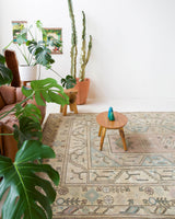 Vintage Turkish rug in living room setting, old rug, antique rug, pastel colors, faded colors, Turkish rug, vintage rug, soft rug, Portland, Oregon, rug store, rug shop, local shop