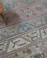Vintage Turkish rug in living room setting, old rug, antique rug, pastel colors, faded colors, Turkish rug, vintage rug, soft rug, Portland, Oregon, rug store, rug shop, local shop