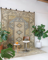 Vintage Turkish rug in living room setting, old rug, antique rug, pastel colors, faded colors, Turkish rug, vintage rug, soft rug, Portland, Oregon, rug store, rug shop, local shop