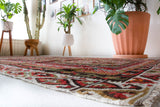 Vintage kilim rug in living room setting, old rug, antique rug, pastel colors, faded colors, Turkish rug, vintage rug, soft rug, Portland, Oregon, rug store, rug shop, local shop, earthy tones, earthy colors, warm colors