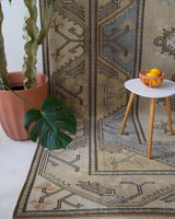 Vintage Turkish rug in living room setting, old rug, antique rug, pastel colors, faded colors, Turkish rug, vintage rug, soft rug, Portland, Oregon, rug store, rug shop, local shop