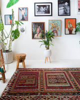 Vintage kilim rug in living room setting, old rug, antique rug, pastel colors, faded colors, Turkish rug, vintage rug, soft rug, Portland, Oregon, rug store, rug shop, local shop, earthy tones, earthy colors, warm colors