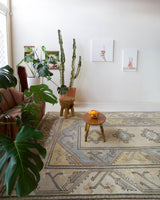 Vintage Turkish rug in living room setting, old rug, antique rug, pastel colors, faded colors, Turkish rug, vintage rug, soft rug, Portland, Oregon, rug store, rug shop, local shop