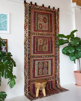 Vintage kilim rug in living room setting, old rug, antique rug, pastel colors, faded colors, Turkish rug, vintage rug, soft rug, Portland, Oregon, rug store, rug shop, local shop, earthy tones, earthy colors, warm colors