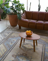 Vintage Turkish rug in living room setting, old rug, antique rug, pastel colors, faded colors, Turkish rug, vintage rug, soft rug, Portland, Oregon, rug store, rug shop, local shop