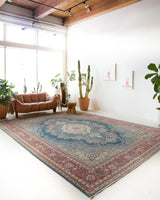 Vintage Turkish rug in a living room setting, pile rug, Turkish rug, vintage rug, portland, rug shop, bright colors, wild shaman, soft rug, bold color, Portland, Oregon, rug store, rug shop, local shop, antique rug