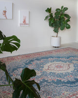 Vintage Turkish rug in a living room setting, pile rug, Turkish rug, vintage rug, portland, rug shop, bright colors, wild shaman, soft rug, bold color, Portland, Oregon, rug store, rug shop, local shop, antique rug