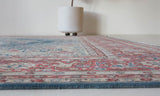 Vintage Turkish rug in a living room setting, pile rug, Turkish rug, vintage rug, portland, rug shop, bright colors, wild shaman, soft rug, bold color, Portland, Oregon, rug store, rug shop, local shop, antique rug