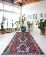 Vintage kilim rug in living room setting, bright colors, wild shaman, soft rug, bold color, Portland, Oregon, rug store, rug shop, local shop, vintage rug, modern kilim, warm colors