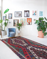 Vintage kilim rug in living room setting, bright colors, wild shaman, soft rug, bold color, Portland, Oregon, rug store, rug shop, local shop, vintage rug, modern kilim, warm colors