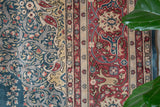 Vintage Turkish rug in a living room setting, pile rug, Turkish rug, vintage rug, portland, rug shop, bright colors, wild shaman, soft rug, bold color, Portland, Oregon, rug store, rug shop, local shop, antique rug