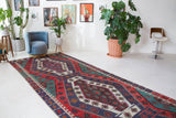 Vintage kilim rug in living room setting, bright colors, wild shaman, soft rug, bold color, Portland, Oregon, rug store, rug shop, local shop, vintage rug, modern kilim, warm colors